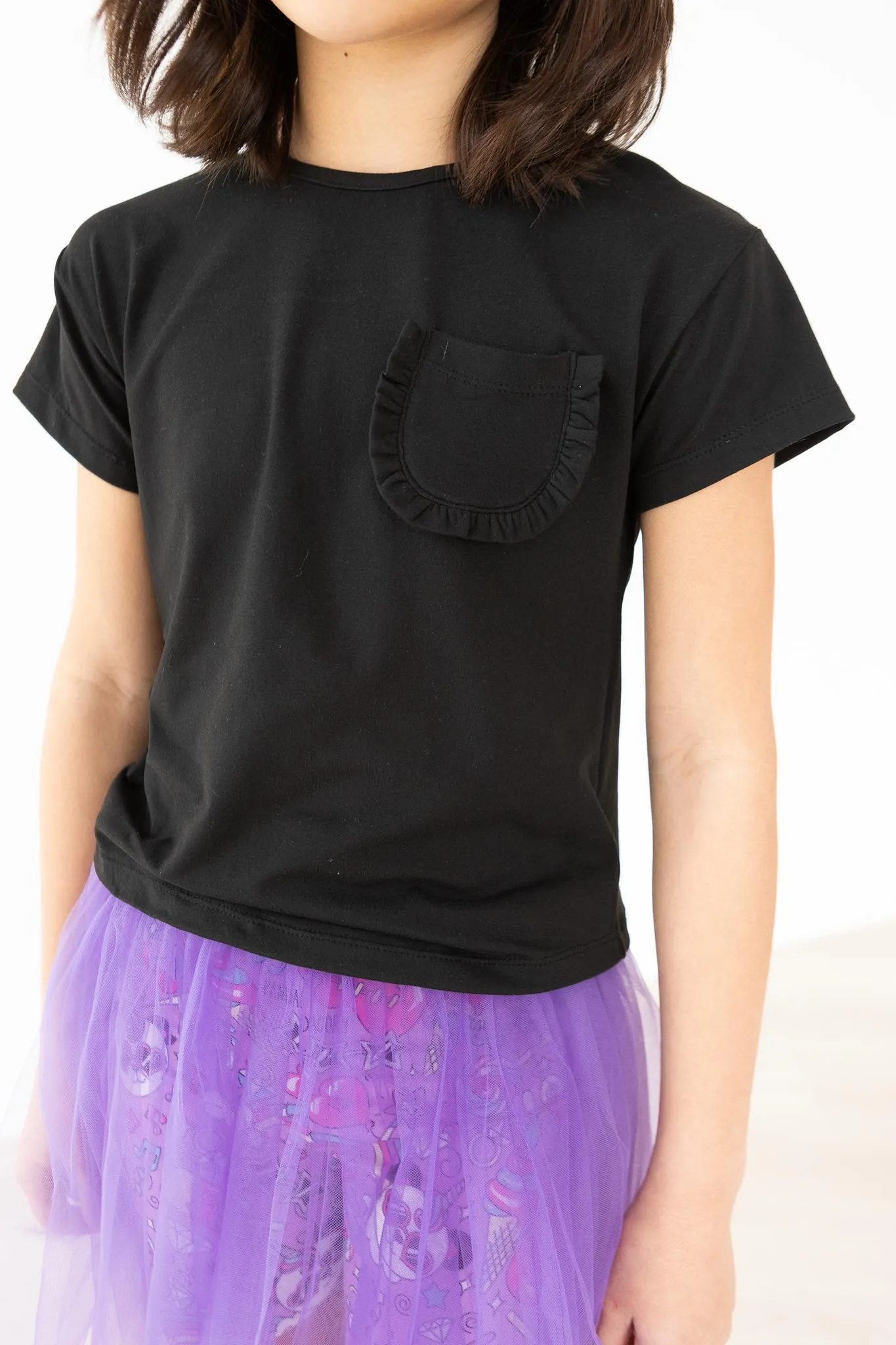 BLACK RUFFLE POCKET TEE